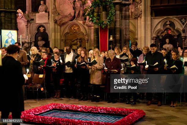 Members of the congregation during the Royal Carols - Together At Christmas service at Westminster Abbey on December 8, 2023 in London, England.