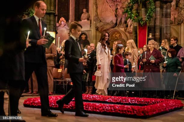 Prince William, Prince of Wales, Prince George, Catherine, Princess of Wales, Princess Charlotte and Prince Louis during the Royal Carols - Together...