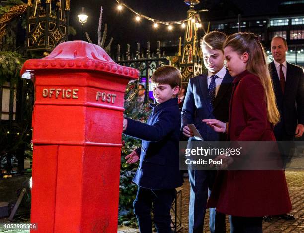 Prince Louis, Prince George and Princess Charlotte during the Royal Carols - Together At Christmas service at Westminster Abbey on December 8, 2023...