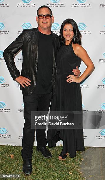 Producer Mike Fliess and Miss America 2012 Laura Kaeppeler attend the Malibu Boys And Girls Club Gala on October 19, 2013 in Malibu, California.