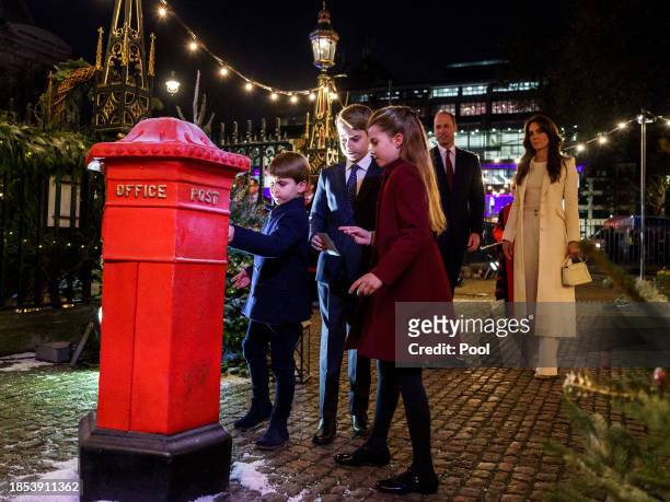 The Prince and Princess of Wales with their children Prince Louis, Prince George and Princess Charlotte during the Royal Carols - Together At...