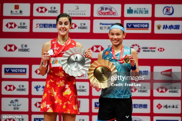 Gold medalist Tai TzuYing of Chinese Taipei celebrates victory in the Women's Singles final match against Carolina Marin of Spain during BWF World...