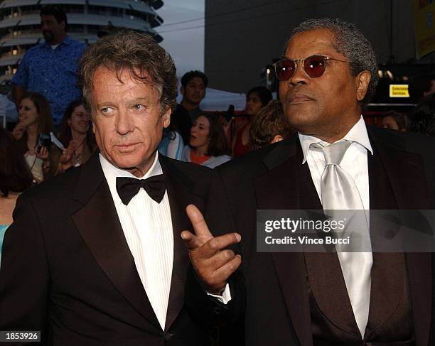 Actors Michael Cole and Clarence Williams III attend the ABC Television Network's 50th Anniversary Special at the Pantages Theatre on March 16, 2003...