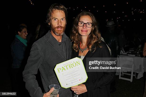 Actress Julia Roberts and Danny Moder attend the Malibu Boys And Girls Club Gala on October 19, 2013 in Malibu, California.