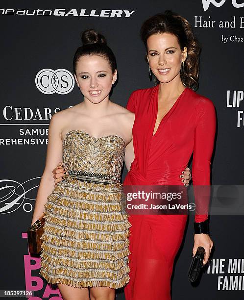 Actress Kate Beckinsale and daughter Lily Mo Sheen attend the 2013 Pink Party at Hangar 8 on October 19, 2013 in Santa Monica, California.