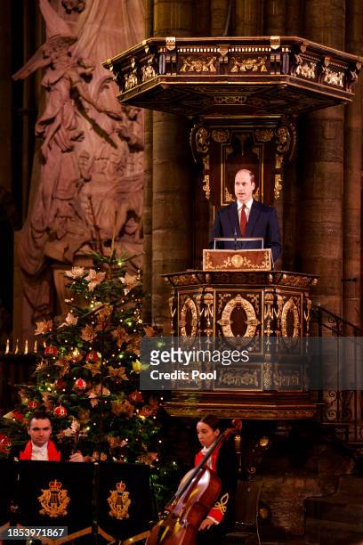 Prince William, Prince of Wales reads Luke 2: 1-7 during the Royal Carols - Together At Christmas service at Westminster Abbey on December 8, 2023 in...