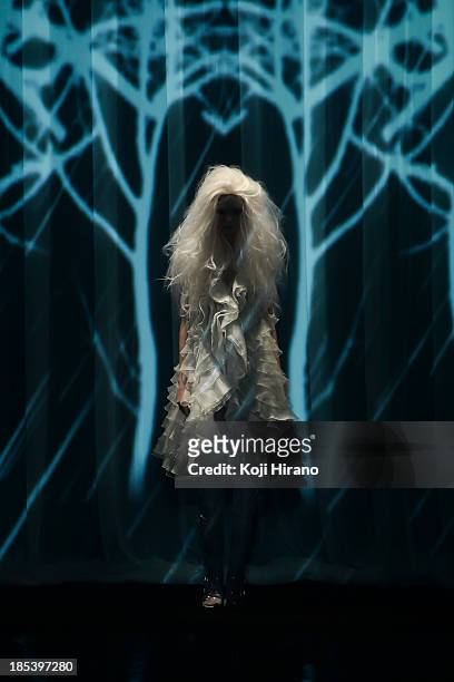 Model showcases designs on the runway during the Alice Auaa show as part of Mercedes Benz Fashion Week TOKYO 2014 S/S at Hikarie B Hall of Shibuya...