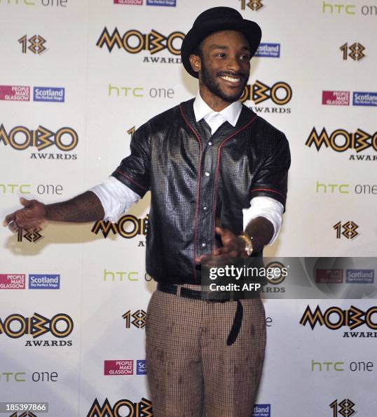 Model And Rnb Singer English RnB singer poses for pictures as he arrives for the 2013 Mobo ...