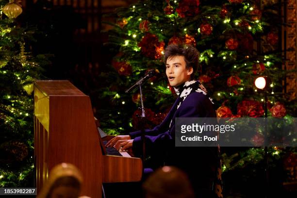 Jacob Collier performs during the Royal Carols - Together At Christmas service at Westminster Abbey on December 8, 2023 in London, England.