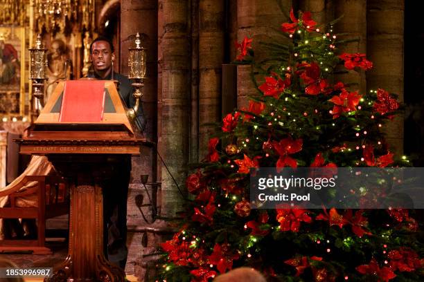 Actor Micheal Ward gives a reading during the Royal Carols - Together At Christmas service at Westminster Abbey on December 8, 2023 in London,...