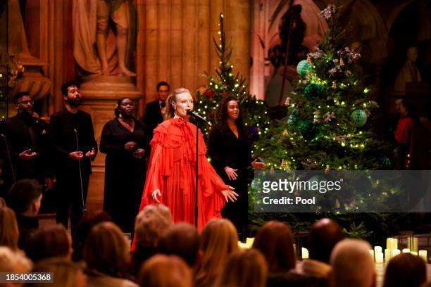 Freya Ridings sings Merry Christmas Everyone during the Royal Carols - Together At Christmas service at Westminster Abbey on December 8, 2023 in...