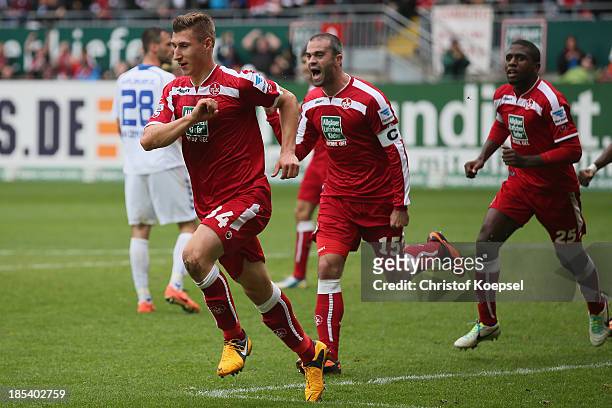 Willi Orban of Kaiserslautern celebrates the second goal with Marc Torrejon and Olivier Occean of Kaiserslautern during the the Second Bundesliga...