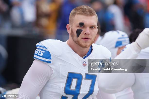 Defensive end Aidan Hutchinson of the Detroit Lions warms up prior to an NFL football game against the Chicago Bears at Soldier Field on December 10,...