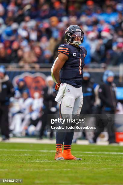 Quarterback Justin Fields of the Chicago Bears stands tall on the field during an NFL football game against the Detroit Lions at Soldier Field on...