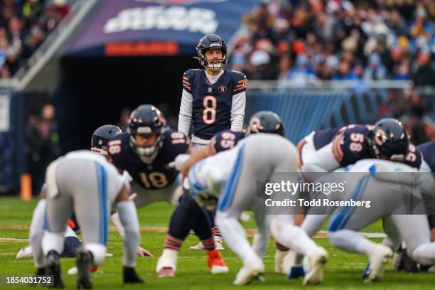 Place kicker Cairo Santos of the Chicago Bears sets up for a field goal during an NFL football game against the Detroit Lions at Soldier Field on...