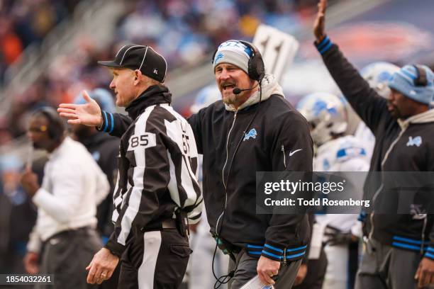 Head coach Dan Campbell of the Detroit Lions argues a call with line judge Daniel Gallagher during an NFL football game against the Chicago Bears at...