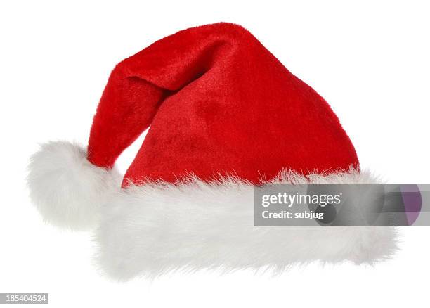 a standard santa claus hat on a white background - father christmas hat stock pictures, royalty-free photos & images