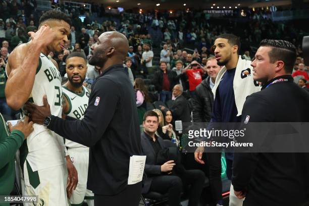 Giannis Antetokounmpo of the Milwaukee Bucks exchanges words with Tyrese Haliburton of the Indiana Pacers following a game at Fiserv Forum on...