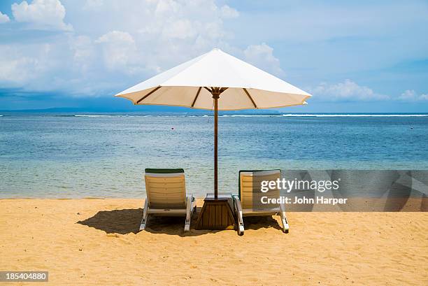 beach chairs, sanur beach, sanur, bali - sanur stock pictures, royalty-free photos & images