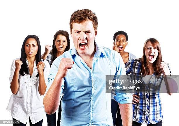 five young people with clenched fists shouting - angry protestor stock pictures, royalty-free photos & images