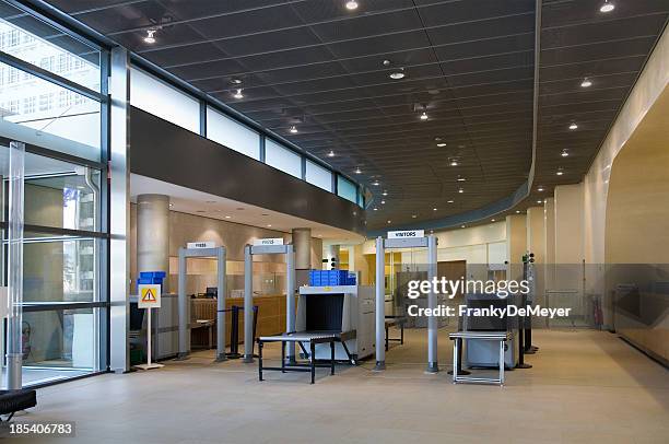 office entrance with security zone - metal detector security stock pictures, royalty-free photos & images