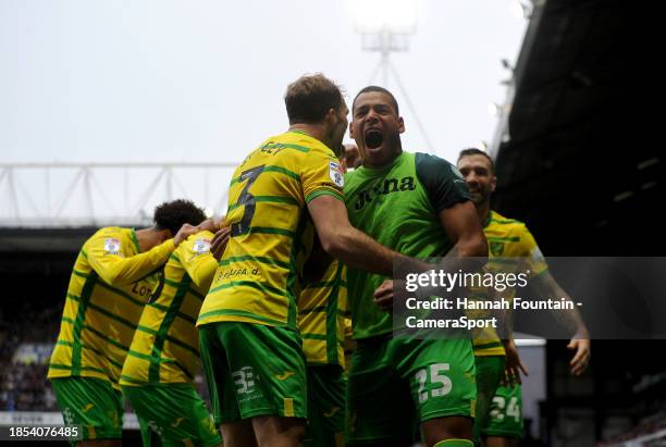 Norwich City players celebrates as Jonathan Rowe scoring his side's first goal during the Sky Bet Championship match between Ipswich Town and Norwich...