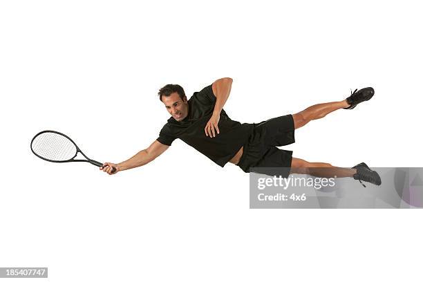 tennis player in action - tennis racquet isolated stock pictures, royalty-free photos & images