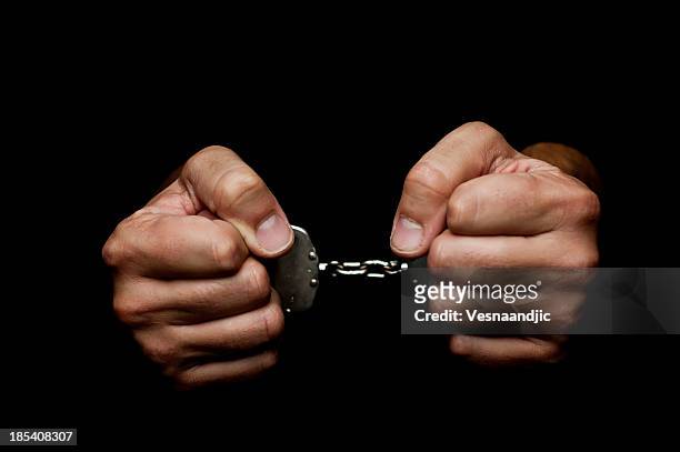handcuffes - arresto foto e immagini stock