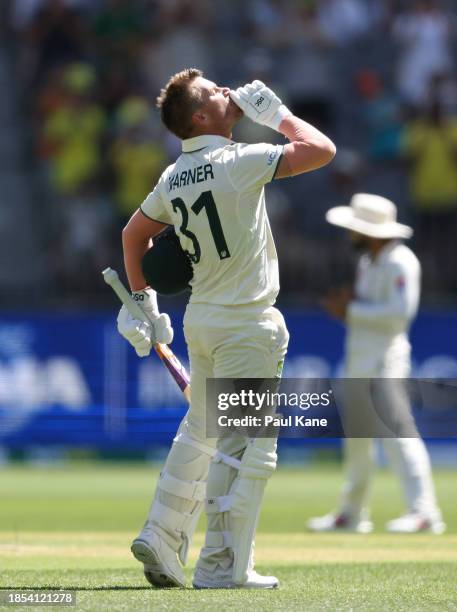 David Warner of Australia celebrates after scoring a century during day one of the Men's First Test match between Australia and Pakistan at Optus...