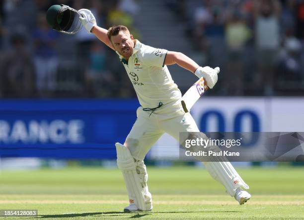 David Warner of Australia celebrates after scoring a century during day one of the Men's First Test match between Australia and Pakistan at Optus...