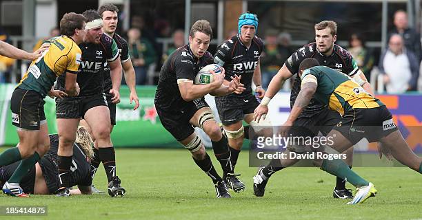 Ryan Jones of the Ospreys charges upfield during the Heineken Cup pool 1 match between Northampton Saints and Ospreys at Franklin's Gardens on...