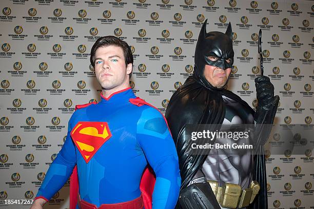 Joshua Carroll and Eric Moran as Superman and Batman attends Nashville Comic Con 2013 at Music City Center on October 19, 2013 in Nashville,...