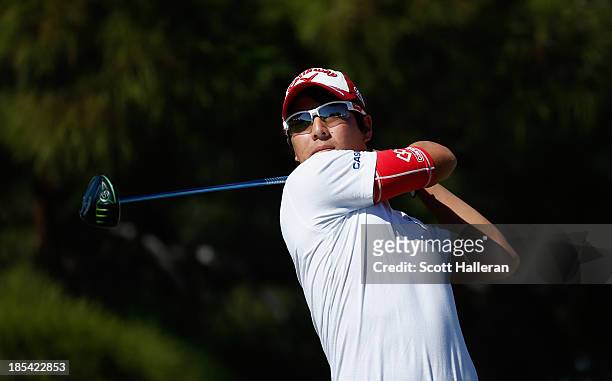 Ryo Ishikawa of Japan watches his tee shot on the first hole during the final round of the Shriners Hospitals for Children Open at TPC Summerlin on...