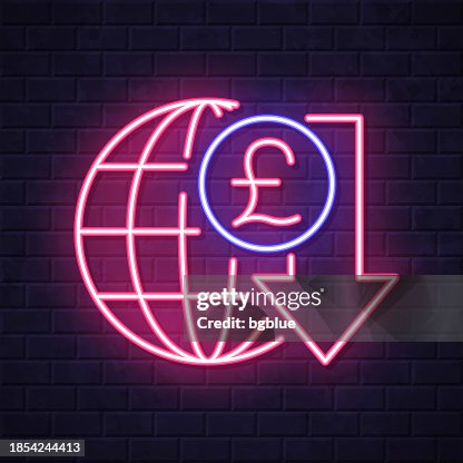 Pound rate decrease. Glowing neon icon on brick wall background Pound rate decrease. Glowing neon icon on brick wall background