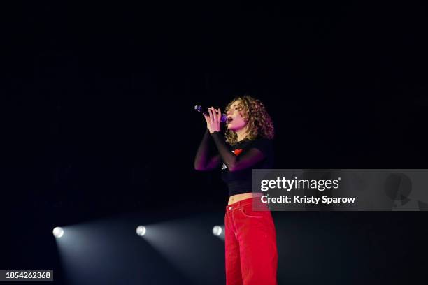 Olympe Chabert performs onstage at Paris La Defense Arena before Bigflo & Oli on December 08, 2023 in Nanterre, France.