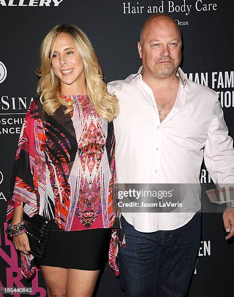 Actor Michael Chiklis and wife Michelle Moran attend the 2013 Pink Party at Hangar 8 on October 19, 2013 in Santa Monica, California.