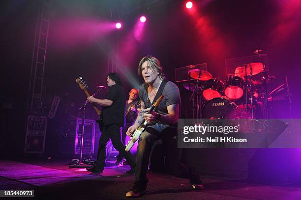 Robby Takac, Brad Fernquist, John Rzenik and Mike Malinin of Goo Goo Dolls performs at 02 academy on October 20, 2013 in Leeds, England.