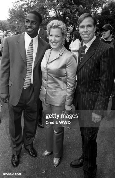 Outtake; Tommy Hilfiger, Bette Midler and friend attend the Fresh Air Fund's Salute to American Heroes at Tavern on the Green June 6, 1997 on New...