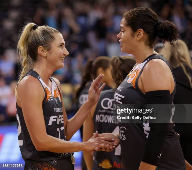 Cassandra Brown of the Fire and Amanda Zahui B of the Fire celebrate the win during the WNBL match between Southside Flyers and Townsville Fire at...