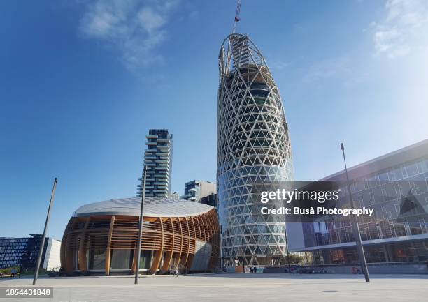 unipolsai tower in construction in the porta nuova district in milan, italy - porta nuova milan stock pictures, royalty-free photos & images