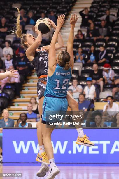Cassandra Brown of the Fire drives to the basket during the WNBL match between Southside Flyers and Townsville Fire at State Basketball Centre, on...