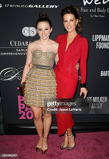 Actress Kate Beckinsale and daughter Lily Mo Sheen attend the 2013 Pink Party at Hangar 8 on October 19, 2013 in Santa Monica, California.