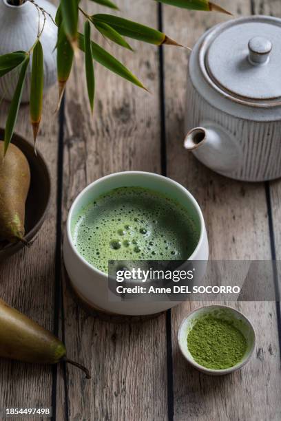 matcha tea in a bowl on a table teapot - ceremony fotografías e imágenes de stock