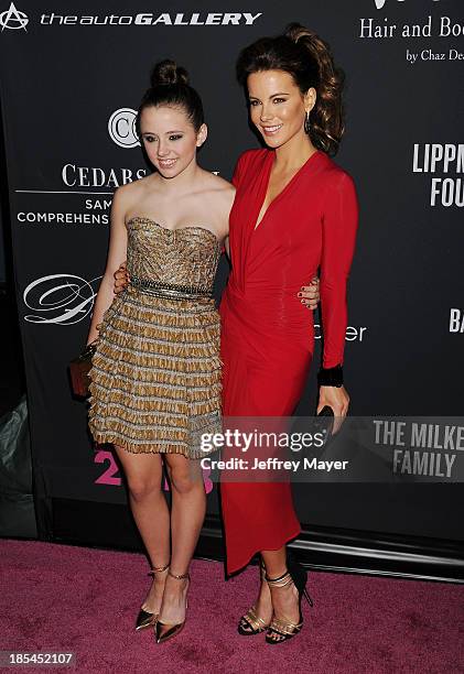 Actress Kate Beckinsale and daughter Lily Mo Sheen attend The Pink Party 2013 at Barker Hangar on October 19, 2013 in Santa Monica, California.