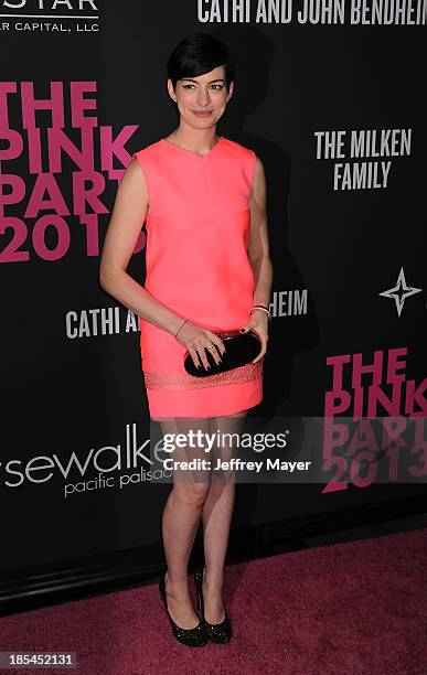 Actress Anne Hathaway attends The Pink Party 2013 at Barker Hangar on October 19, 2013 in Santa Monica, California.