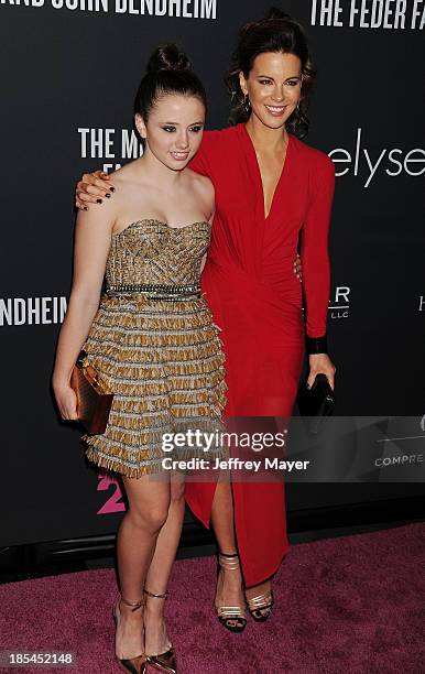 Actress Kate Beckinsale and daughter Lily Mo Sheen attend The Pink Party 2013 at Barker Hangar on October 19, 2013 in Santa Monica, California.