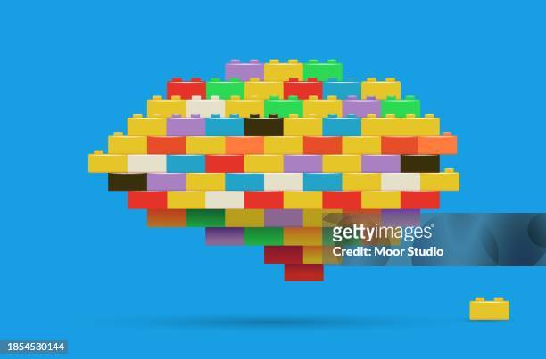 brain made of toy bricks vector illustration - kid creativity stock illustrations