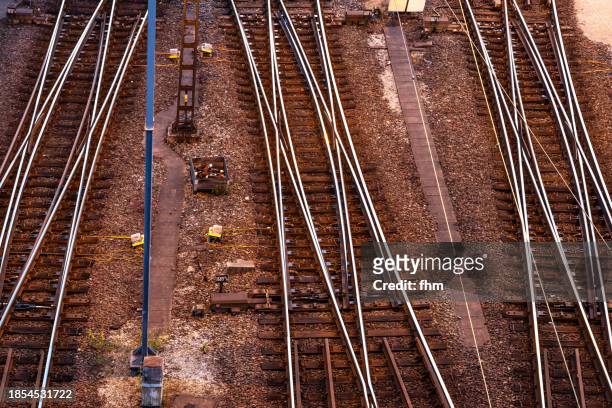 empty railway tracks and switches at a marshalling yard - consumer protection stock pictures, royalty-free photos & images