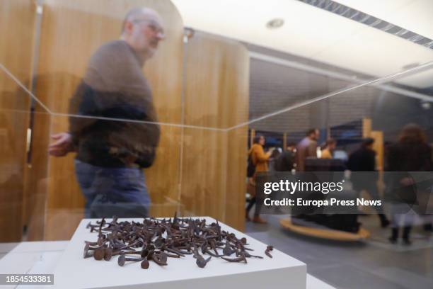 Man observes the exhibition 'Nuestra Señora de las Mercedes. Una historia en comun', at the Museo Nacional de Arqueologia Subacuatica ARQVA, on 14...