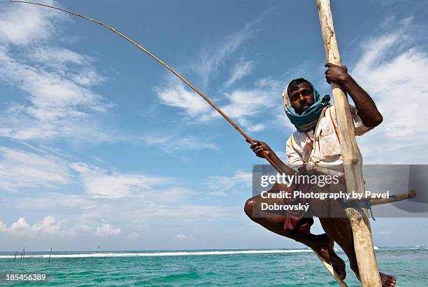 stilts fisherman - sri lanka fisherman stock pictures, royalty-free photos & images